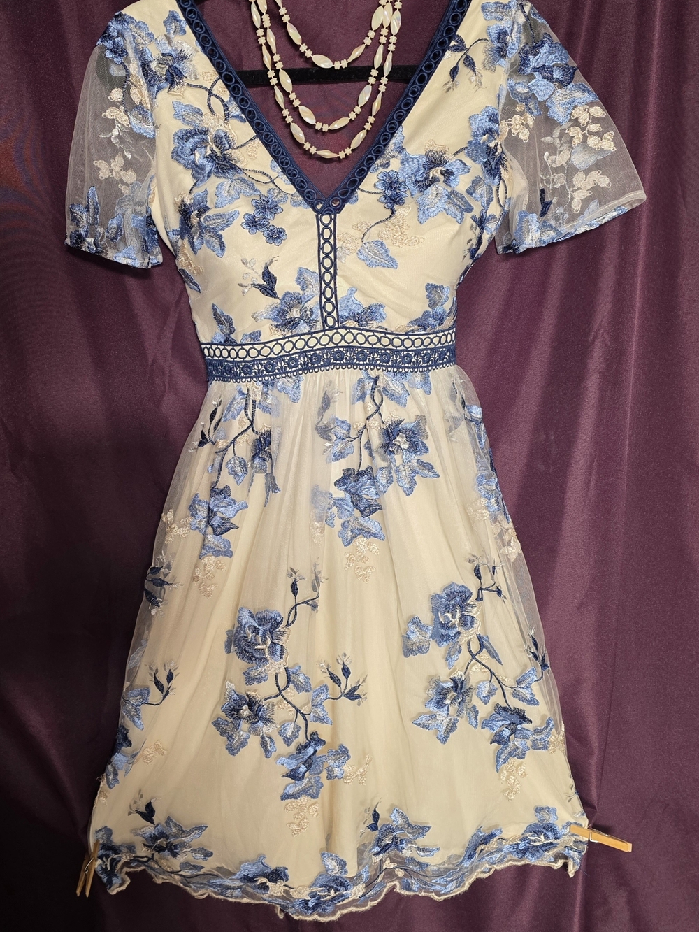 Chi Chi London brand cream and blue embroidered semi- formal or formal dress